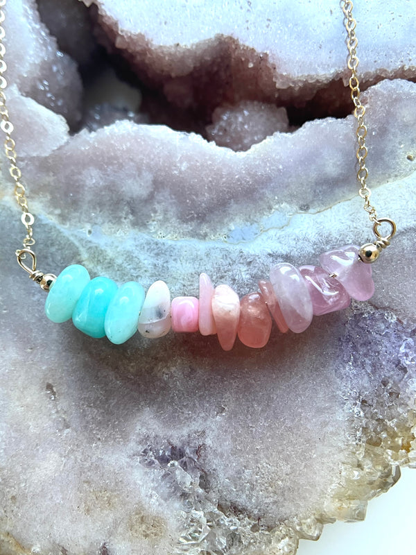 necklace gold or silver with blue amazonite pink opal rhodocrosite and pink rose quartz fashioned in bar style with two complimenting balls 
